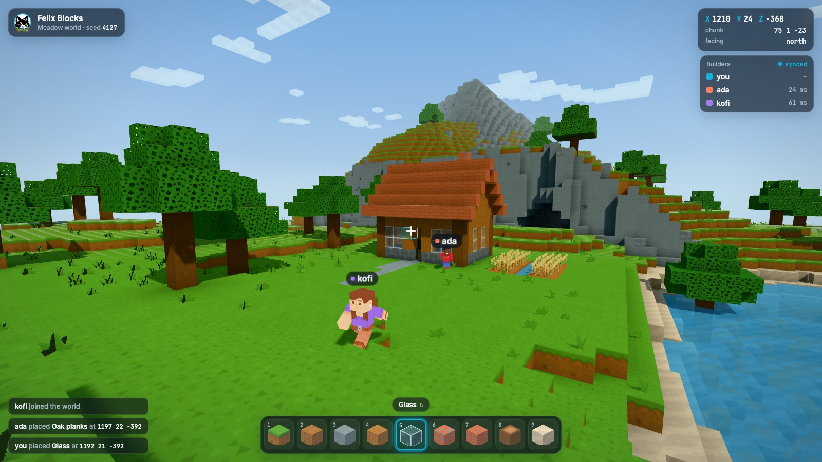 Felix Blocks style frame: a first-person view across a meadow to a wooden house with a red roof, two other players with name tags, the block hotbar and the builders list